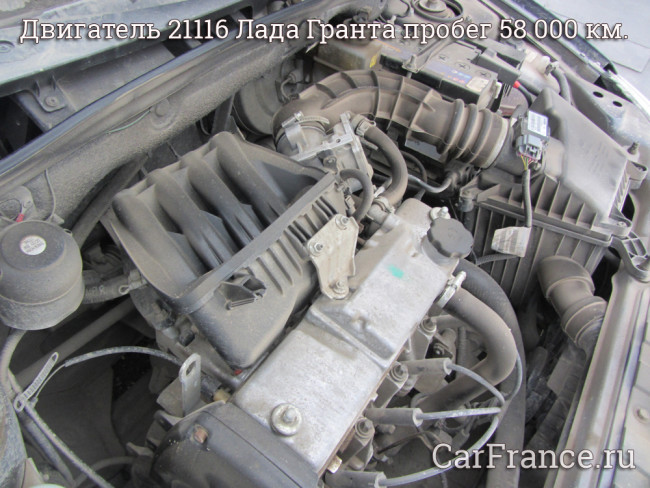 Двигатель Лада Гранта 21116 грязный вид сбоку