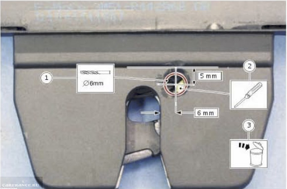 Крышка замка багажника и схема высверливания на Форд Фокус 2