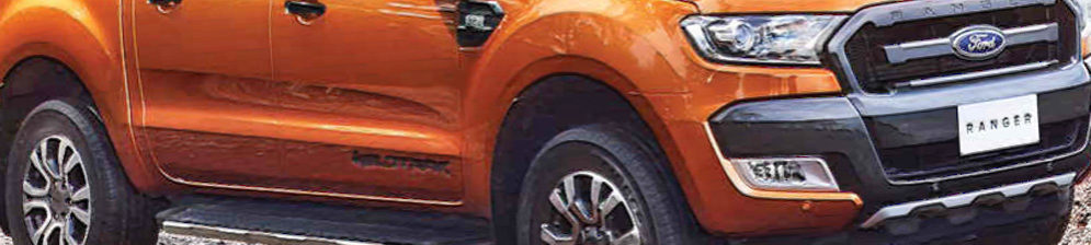 Форд Рейнджер 2018 модельного года вид сбоку в оранжевом цвете